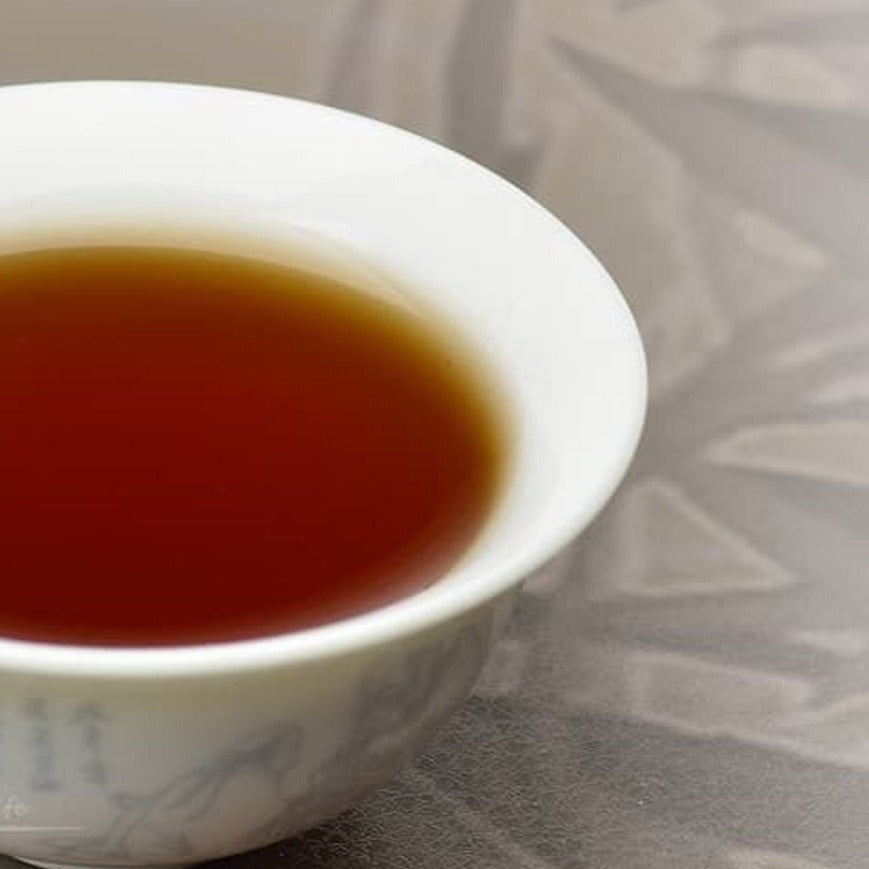 Tangerine Aged Pu-erh Tea in a Cup